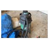 shop vac 2.0 hp shop vacuum with some blue tarps to go with it