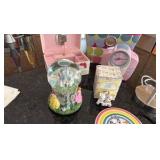 A little girls lot with a Barbie clock radio, a Disney music box, lamp, jewelry box