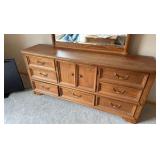 Thomasville Oak long dresser with great storage and mirror