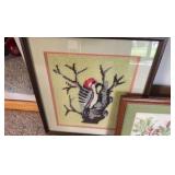 three framed needlepoint pictures