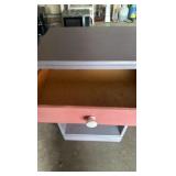 pink and purple painted nightstand