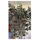Artificial tree in pot with birds in the leaves