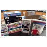 Assortment of kids, chick flick movies and VHS tapes
