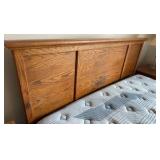 King size Oak headboard board from Thomasville with Serta comfort hybrid blue fusion firm mattress and boxspring