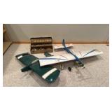vintage handcrafted airplanes with toolbox used for repairs