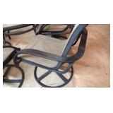 Glass top patio set with four chairs