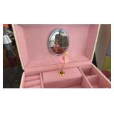 A little girls lot with a Barbie clock radio, a Disney music box, lamp, jewelry box
