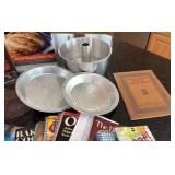 cookbooks galore, and some baking tins to go with it