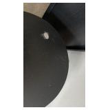 Black solid bookcase and round table