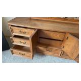 Thomasville Oak long dresser with great storage and mirror