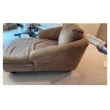 Suede style material Chase lounge with end table and blue lamp