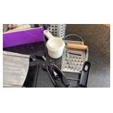kitchen tool collection with a slicer dicer and other fun utensils
