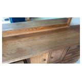 Thomasville Oak long dresser with great storage and mirror