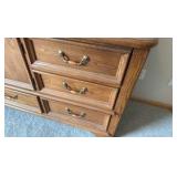 Thomasville Oak long dresser with great storage and mirror