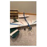vintage handcrafted airplanes with toolbox used for repairs