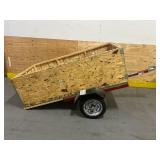 4 Foot Haul Master 1090 LB Capacity Utility Trailer with 12" Wheels and Custom Built Wooden Enclosure
