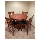 Cherry Finish Round Extension Dining Table with 4 Cushioned Chairs
