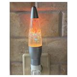 Decorative Lava Lamp Centerpiece with Three Pillar Candles on Pebble Tray
