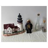 Nautical Miniature Lighthouse with Sailor Figurine, Glass Bottles & Seashells