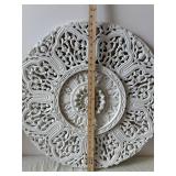 Handwoven Circular Yarn Wall Hanging with Pom-Pom Accents and Two Ornate Round Wall Plaques