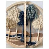Handwoven Circular Yarn Wall Hanging with Pom-Pom Accents and Two Ornate Round Wall Plaques