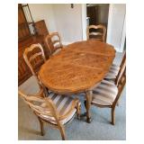 Beautiful Parquet Topped dining room Table with six chairs