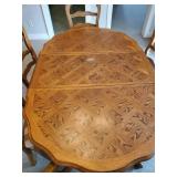 Beautiful Parquet Topped dining room Table with six chairs