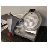 Solid industrial Berkel Meat Slicer Heavy Duty powers up