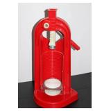 Red Plastic Fluid Pump with Clear Tubing and Cleaning Brush in Bucket