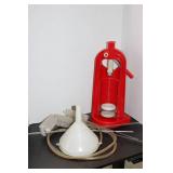 Red Plastic Fluid Pump with Clear Tubing and Cleaning Brush in Bucket