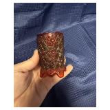 Red glass votive with uranium glass