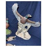Lot of decorative birds, ducks, pheasants