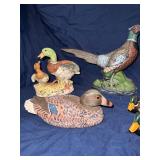 Lot of decorative birds, ducks, pheasants