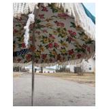 Vintage floral patio umbrella with tassels