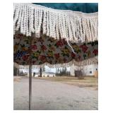 Vintage floral patio umbrella with tassels