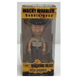 Misc. Walking Dead Wacky Wobbler Bobble Heads Including Rick Grimes, Daryl Dixon And Walker Merle (New Old Stock)