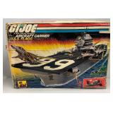 1985 GI Joe USS Flagg Aircraft Carrier Pre-Owned With Original Box (Box Beat Up And Some Pieces Missing) See Photos And 1983 Skystriker (Some Pieces Missing)
