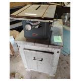 Dunlap table saw on wooden stand