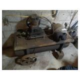 Antique air compressor with hoses