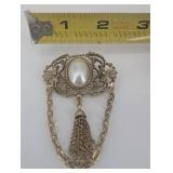 Vintage Gold-Tone Filigree Brooch with Oval Cabochon and Chain Tassels