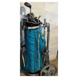 LL - Bag Boy Carrier With Vintage Golf Clubs - Assorted Irons and Woods