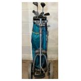 LL - Bag Boy Carrier With Vintage Golf Clubs - Assorted Irons and Woods