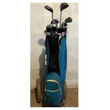LL - Bag Boy Carrier With Vintage Golf Clubs - Assorted Irons and Woods
