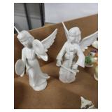 Porcelain Angel Figurines Lot with Landscape Egg Ornaments and a Lady with Chickens