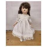 Antique German Porcelain Doll with Brown Hair in White Lace Dress marked Gebruder