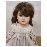 Antique German Porcelain Doll with Brown Hair in White Lace Dress marked Gebruder