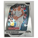 Lot of 3 Basketball Cards including 2025 Panini Prizm Monopoly Victor Wembenyama, 2021 Panini Prizm Draft Picks Anthony Edwards, and 2024-25 Panini Prizm Emergent Stephon Castle Rookie Card (NM-MT)