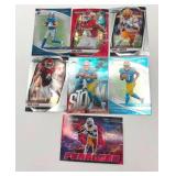 Lot of 7 Football Rookie Cards including Omarion Hmapton, Isaac TeSlaa, and More!