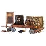 LL - Mosler Junior Safe with Assorted Vintage Tin Items on Wood Wagon