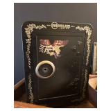 LL - Mosler Junior Safe with Assorted Vintage Tin Items on Wood Wagon